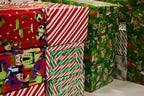 Wrapped holiday gift boxes in festive paper
