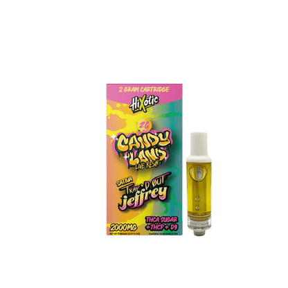 Trap'd Out Jeffrey 2G Cherry Bomb hybrid cartridge showing the clear glass and colorful label with product branding.
